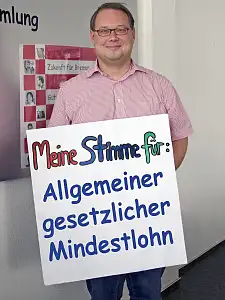 Hauke Nehring mit Schild: Meine Stimme für ...