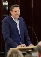 Gero Sieling am Redepult 
&tilde; Bildnachweis: Rebecca Miller, Fotoarchiv SKB-Bremen